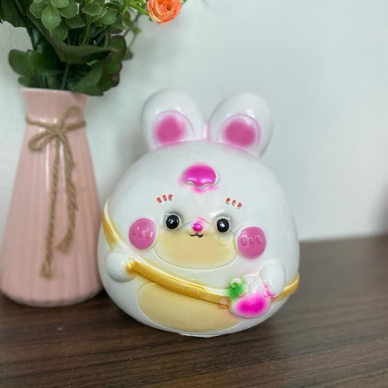 Heo đất tiết kiệm/thỏ đeo túi quả dâu size trung 0
