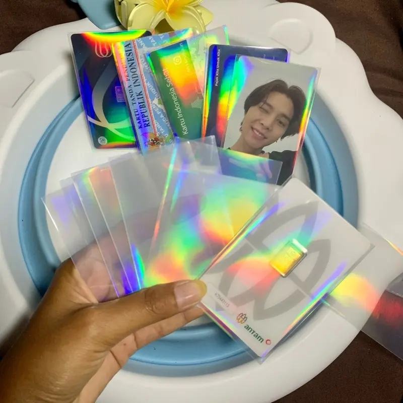 ISI 12 biji cover hologram & plastik opp untuk logam mulia antam, ubs, ktp, kta, sim, card lainnya serbaguna ISI 12 biji cover hologram & plastik opp untuk logam mulia antam, ubs, ktp, kta, sim, card lainnya serbaguna