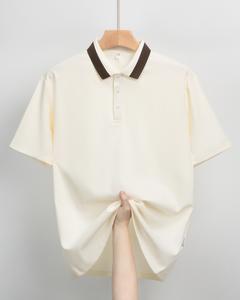 新しいメンズパッチワークカラーポロシャツ、柔らかく肌に優しい生地、スタイリッシュでカジュアルなデザイン、メンズラペルトシャツ