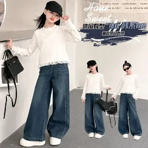 Sweet Style Baju Anak Perempuan Lengan Panjang Putih dengan Celana Jeans Lebar dan Topi Hitam