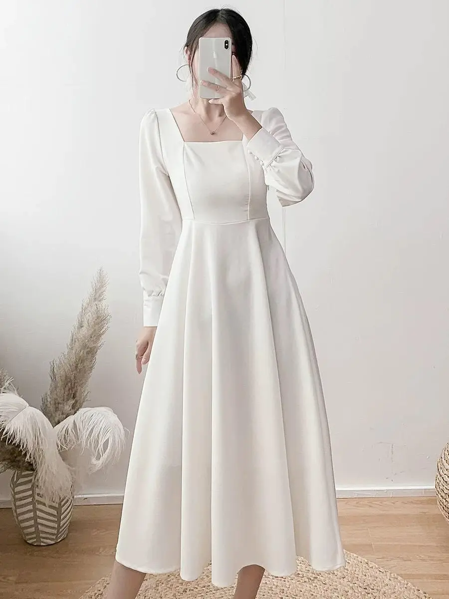 Gaun Putih Elegan Gaya Korea Dress Lengan Panjang A-Line, Cocok untuk Prewedding & Acara Spesial Gaun Putih Elegan Gaya Korea Dress Lengan Panjang A-Line, Cocok untuk Prewedding & Acara Spesial
