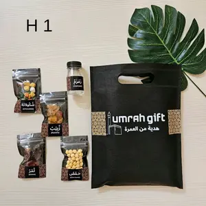 Souvenir paket oleh oleh haji umroh tas snack zam-zam kurma kacang arab kismis cokelat almond pistachio sajadah travel