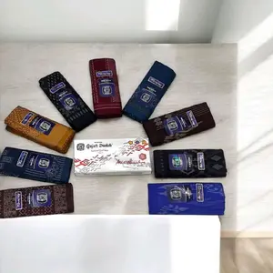 Sarung Tenun Gajah Duduk Asia Nusantara Kembang Motif Elegan Warna Hitam & Biru Bahan Premium Nyaman untuk Shalat dan Kegiatan Formal