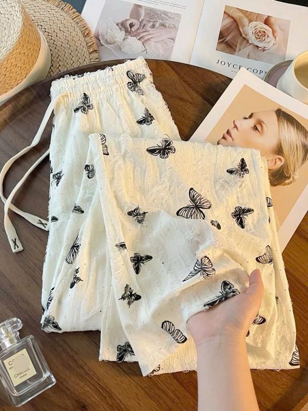Quần suôn Nữ Vải thun nổi Xước In Bướm Đính đá Phối Dây Lai Luồng Eo TP801