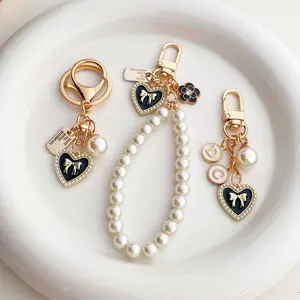 HEYACC Gantungan Kunci Gantungan hp aesthetic korea style Bluetooth Tas Aksesoris Liontin Dengan Mutiara SM562 HA