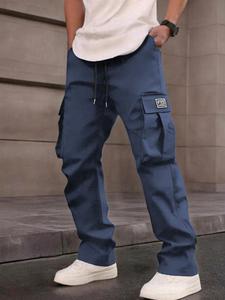 Pantalones de trabajo para hombre holgados con múltiples bolsillos, cintura elástica con cordón ajustable, pantalones largos casuales deportivos versátiles, cómodos y estilosos
