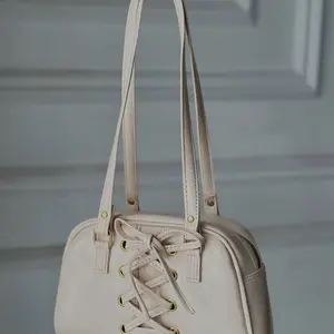 La Diané - Tas Tangan Celeste dengan Tali Lace Up Elegan dan Desain Minimalis untuk Gaya Harian Anda