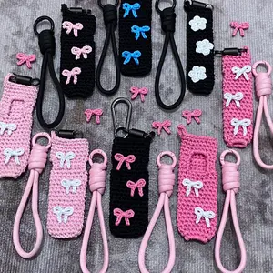 Handmade case rajut motif pita gantungan bunga