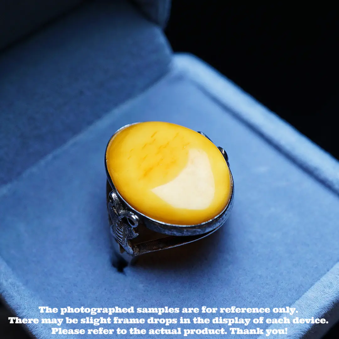 This is a ring made of natural raw ore amber and beeswax.