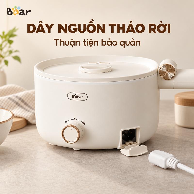 Nồi điện đa năng Bear 1.6L, lòng nồi chống dính dễ vệ sinh, điều chỉnh bằng núm xoay tiện lợi, tự động ngắt khi quá nhiệt hoặc thiếu nước, dây nguồn tháo rời, thiết kế nhỏ gọn hiện đại, phù hợp nấu ăn hằng ngày.