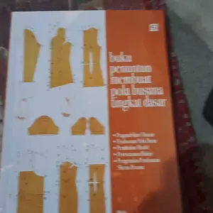 Buku penuntun membuat pola busana tingkat dasar oleh SOEKARNO