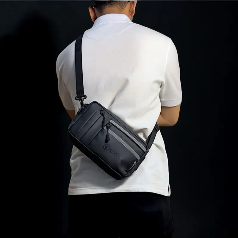 KODEIKU Clutchbag Luca Multifungsi Glow in The Dark Handbag Slingbag Selempang bercahaya Scotlight Reflektor Pria Waterproof Clutches clutch bag Waistbag Hitam cowok tas tangan keren 0