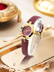 4311Z-Jam tangan wanita berukuran kecil yang elegan, dengan kombinasi warna merah dan emas yang kontras, cocok untuk berbagai gaya. Watches