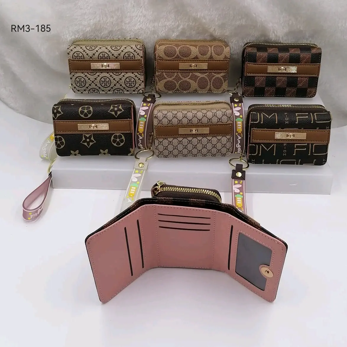 dompet lipat tiga koin motif