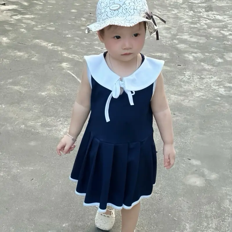 (ĐẦM)VÁY LIỀN Xếp Ly Cổ Bẻ Dây Nơ Xinh Yêu Bé Gái-Vải Poly Mềm Mịn Thoáng 9-19kg 2