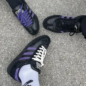 sepatu senaekers sepatu casual style Pria hitam dengan variasi warna ungu ozy osbourneeee