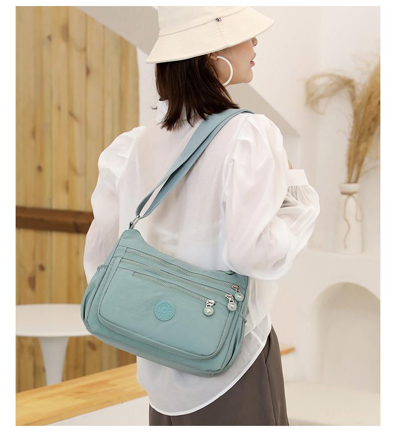Product Introduction of Túi Đeo Chéo Nylon Chống Thấm Nước Cho Nữ, Túi Du Lịch Sức Chứa Lớn Có Khóa Kéo Nhiều Lớp Cho Bé Gái, Túi Đưa Thư Đựng Đồ Giải Trí Ngoài Trời Đeo Vai 2