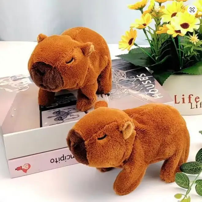 Mainan Boneka Kapibara Elektronik Berjalan Mencicit Anjing Kapibara Dapat Berjalan Lucu