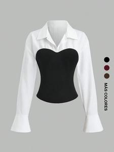 Esta blusa blanca de mujer de manga larga con mangas abullonadas y diseño de parches es elegante y versátil, adecuada para uso diario y diversas ocasiones.