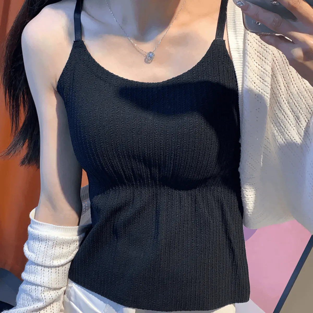 The new inner top with a beautiful back is a great match and comes with cups