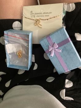 Product Review of Bow Pendant Necklace with Dancing Chain - RXD-136 Minimalist Stainless Steel Non Tarnish double platted Hypoallergenic from p**🎀 0