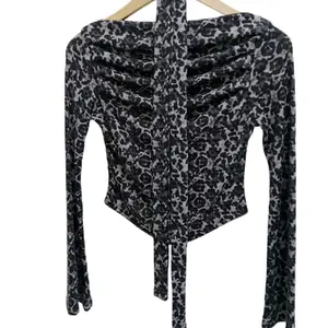 Atasan wanita Off-Shoulder Leopard