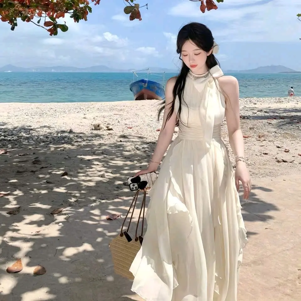 Đầm váy maxi màu kem cổ yếm đi biển,buộc nơ cổ vải voan có lót, tà lượn sóng nhẹ nhàng Nữ Women, váy đi chơi, đi biển sang chảnh ht20