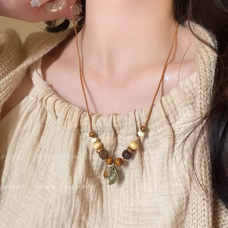 Literary girl ~ New Chinese style hand-woven rope dried fruit pendant necklace ins niche design clavicle chain retro accessories