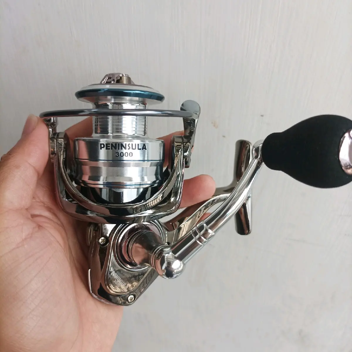 Reel Hinomiya Peninsula 3000 Power handle