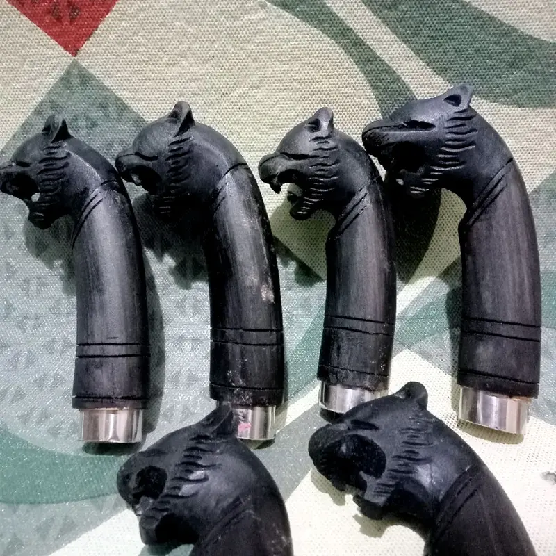 gagang atau pegangan 12cm golok rasa mala murah seni ukir macan  hitam elegan bahan kayu rasamala 1