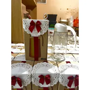 ISI 100 (SOUVENIR BOTOL MINYAK 630 ML DENGAN HIASAN PITA + KARTU)