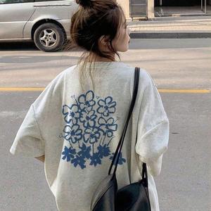 レディース半袖Tシャツ、トレンドブルーフラワープリントクルーネック、ゆったり、コットンカジュアルトップス、クルーネック、ゆったりシルエット、レディースサマープリントTシャツ