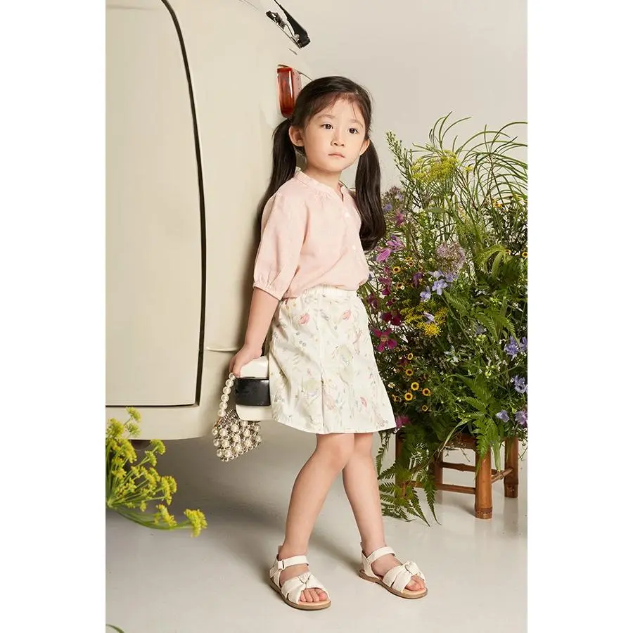 THECLOSETLOVER KIDS' CLOVER SKIRT IN WHIMSICAL GARDEN