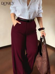 Pantalones de mujer talla grande de pierna ancha, tejido con caída elegante, cintura alta con decoración de hebilla metálica, uso casual de oficina y multiusos