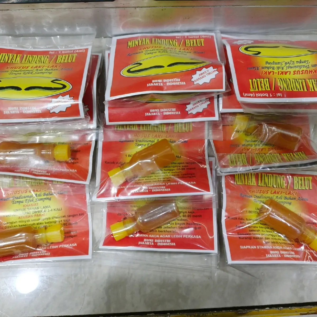 MINYAK LINDUNG/BELUT KUNING OBAT OLES LUAR
