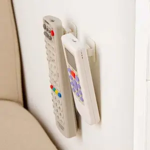 tempat gantungan remot remote AC TV DVD dll dengan lem perekat double