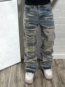 Jeans para hombre azul claro con lavado de nieve, roturas pesadas, cintura media y bragueta con botones; moda urbana, aptos para todas las estaciones, jeans de denim de tendencia.