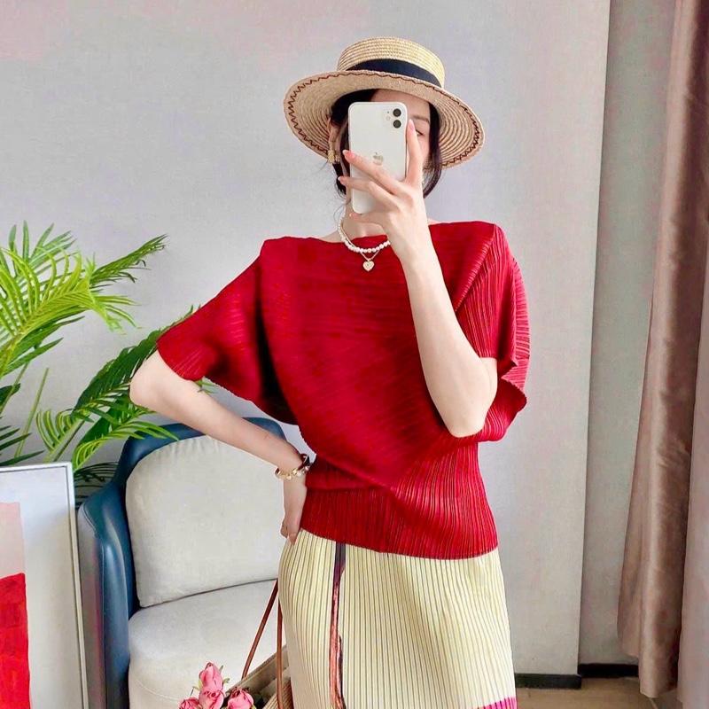 Áo tay ngắn chất vải thun lò xo dập ly được thiết kế với dáng áo cách điệu che khuyết điểm tốt - 55Kg.Linh
