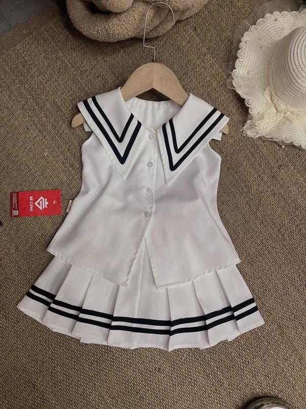 Set Áo Vest Trắng Sát Nách Viền Xanh Đen Kèm CV Xếp Li Trắng Viền Xanh Đen 40QDành Cho Bé Gái