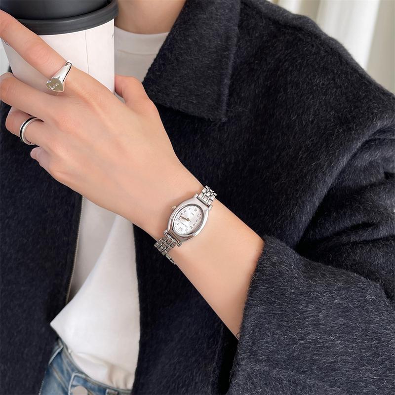 Product Introduction of Đồng Hồ Đồng Hồ Đeo Tay Nữ, Thiết Kế Thanh Lịch, Phong Cách Cổ Điển Mặt Số Hình Bầu Dục, Đồng Hồ Thạch Anh Tinh Tế Thích Hợp Cho Học Sinh, Tặng Kèm Dụng Cụ Tháo Liên Kết Dây Đeo 17