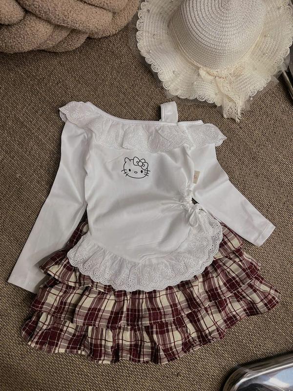 Set Áo Thun Trắng Tay Dài Vai Kiểu (Kitty) Kèm Chân Váy 3 Tầng Caro Đỏ Đậm 45H Dành Cho Bé Gái
