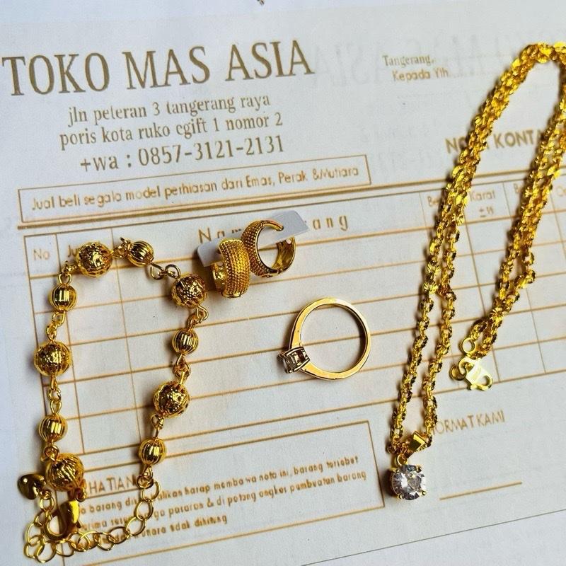 Set perhiasan mas muda wanita dewasa