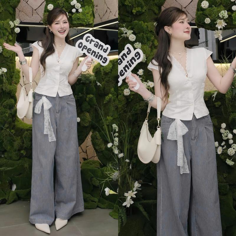 Set nữ thiết kế EMME T3227 2 món gồm áo xô thêu hoa tay lỡ viền ren cột dây nơ phối quần tây nữ dáng suông cách điệu - THANH TỰ