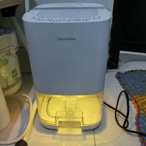 Tixx Dehumidifier PREMIUM INT-DH-80 untuk Rumah & Kamar Tidur, Kapasitas 1000ml, Pengering Udara 50m², Desain Compact, LED Indikator, Garansi 12 Bulan - Putih