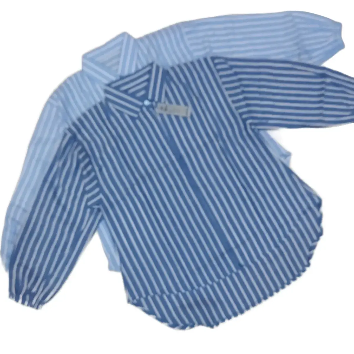 Blus Katun Salur Model Oversize Pinguin dengan Kancing Aktif Motif Garis