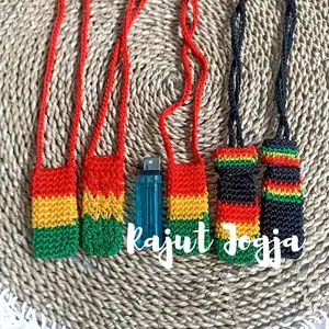 kalung korek rajut motif rasta , sarung korek rajut , gantungan korek,tempat korek