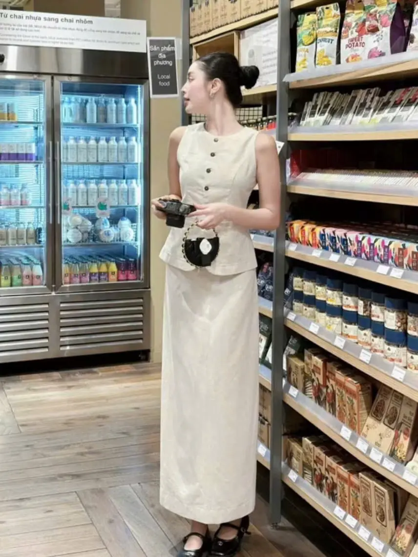 Sét bộ váy sát nách chất đũi linen màu be áo sát nách dáng peplum phối chân váy suông midi 2 lớp nhẹ nhàng thanh lịch cho nữ