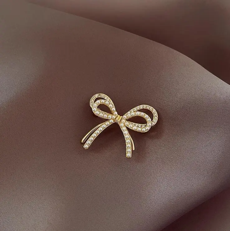1 fashionable, elegant, and shiny double layered bow brooch for clothing, paired with pearl rhinestone geometric pins