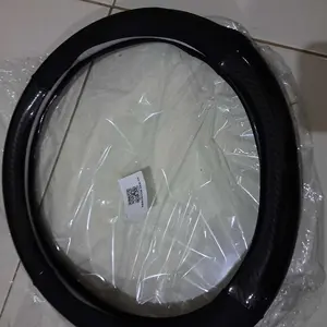 Sarung setir mobil berbahan serat karbon berkualitas tinggi, anti selip, bulat, berventilasi, dan menyerap keringat.