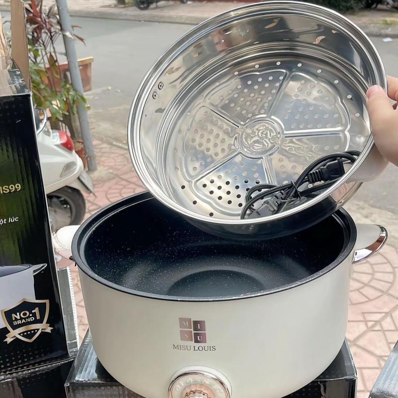 Nồi lẩu điện đa năng . Chiên .xào .lấu . Đều được nồi ăn lẩu nướng . Tặng kèm giá hấp inox ( shop gửi mầu ngẫu nhiên )